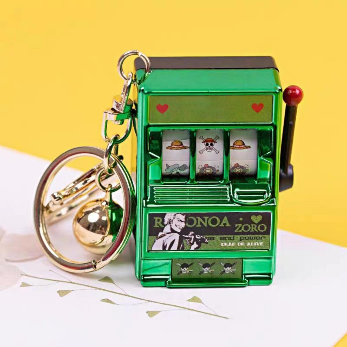 Porte-clés Luffy/Zoro Machine à sous fruitée Pendentif livre pop-up Machine à sous