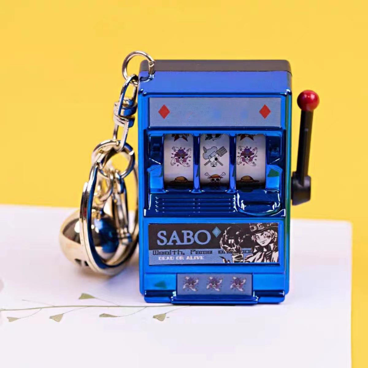 Porte-clés Luffy/Zoro Machine à sous fruitée Pendentif livre pop-up Machine à sous